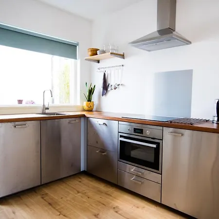 Het Melkmeisje * Huizen