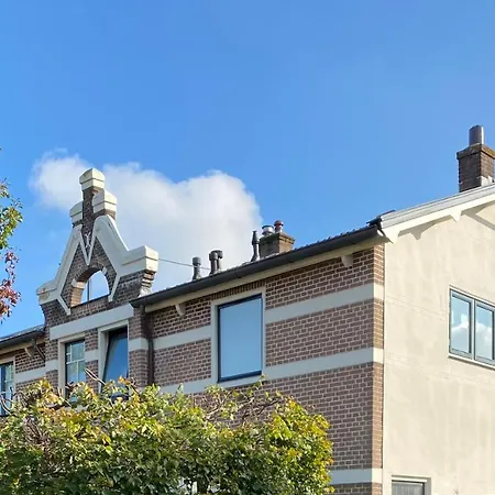 Het Melkmeisje * Huizen